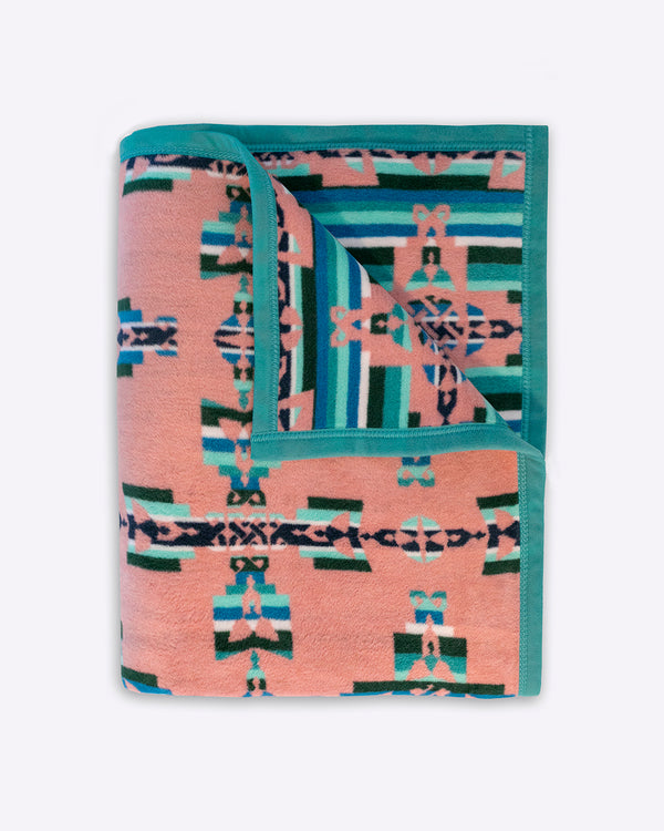 Folded Mother and Child Celtic Blanket with one corner showing reverse image