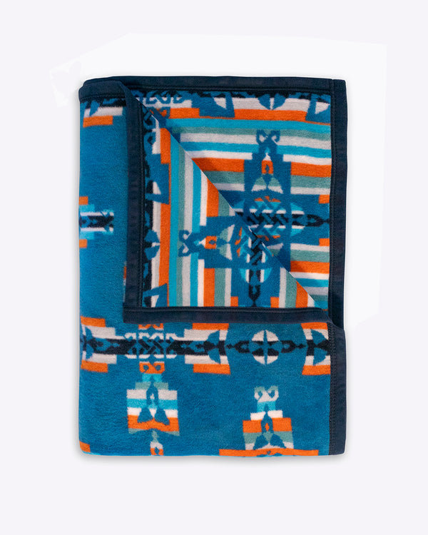 Celtic folded mother and child symbol blanket with the reverse side corner folded out