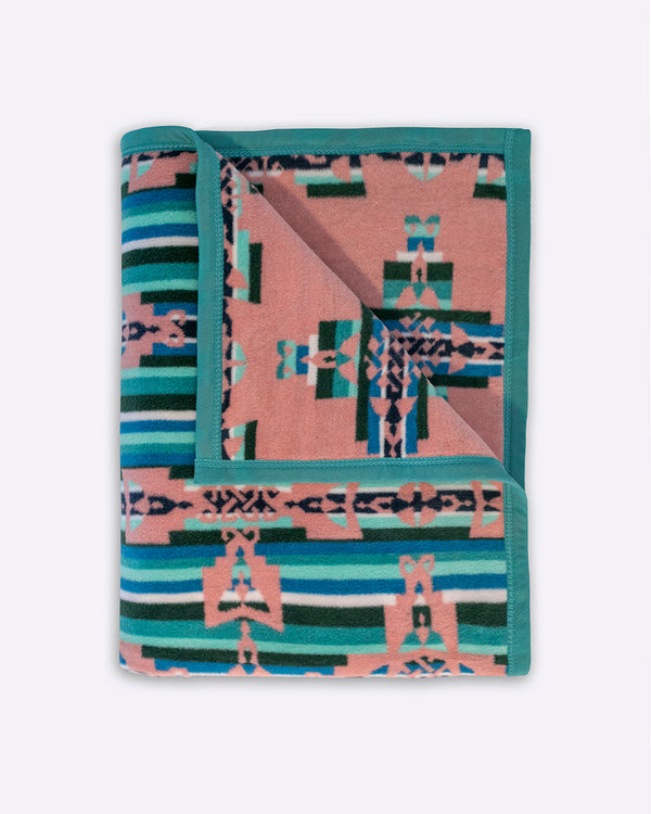 Mother and Child Celtic geometric symbol folded blanket in reverse, showing green stripe side with pick background on the other side