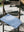 Checkered dark blue blanket folded on a chair